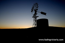 Sunset over old windmill